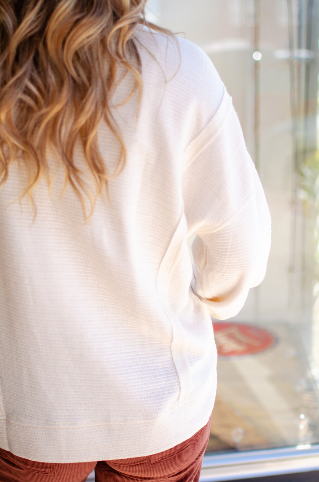 Cozy Day Split Neck Exposed Seam Long Sleeve Knit Top In Cream