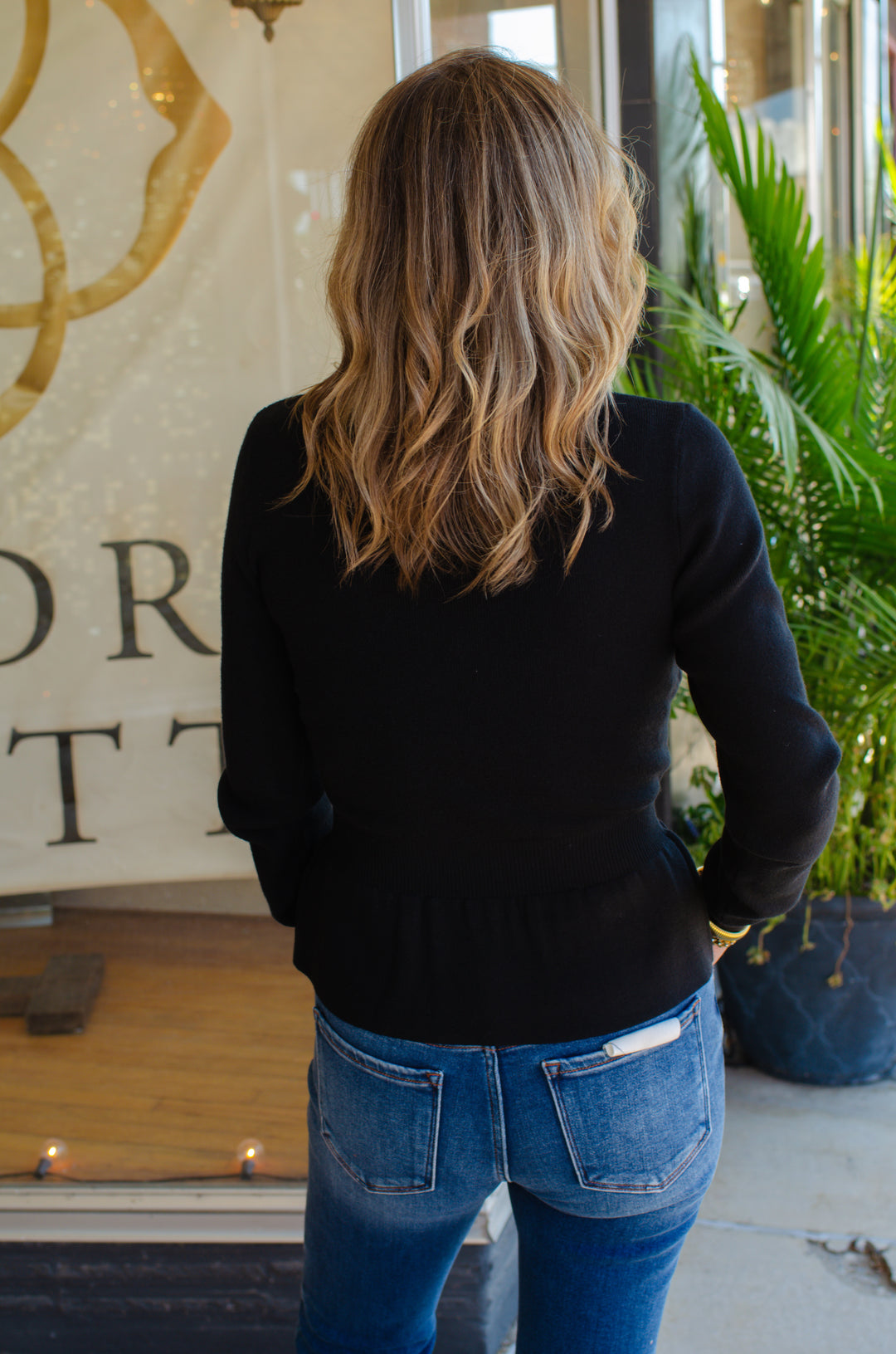 Hold Me Close Fitted Peplum Sweater in Black