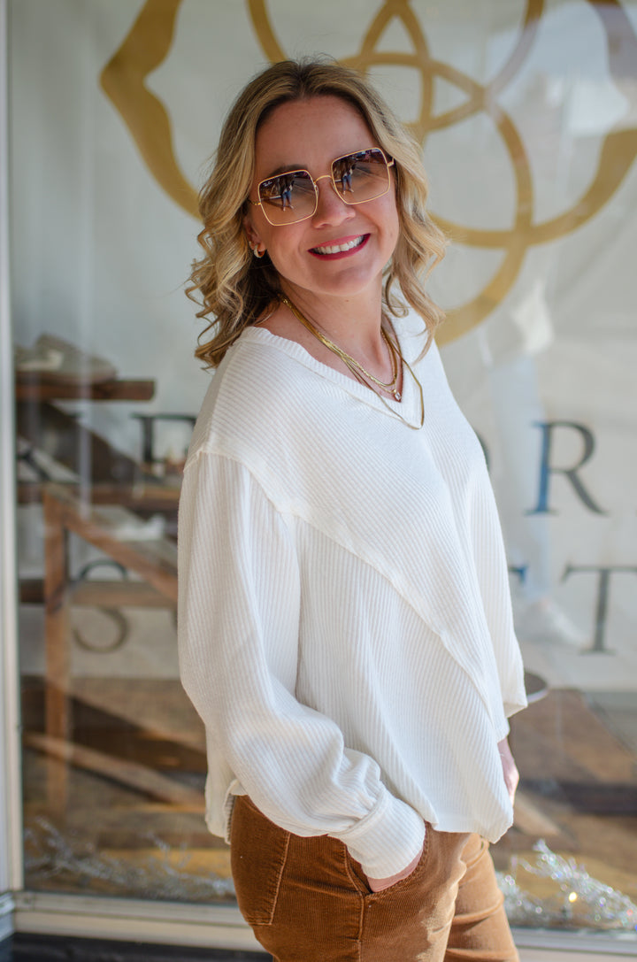 Our Love V-Neck Long Sleeve Side Cut Top in Cream