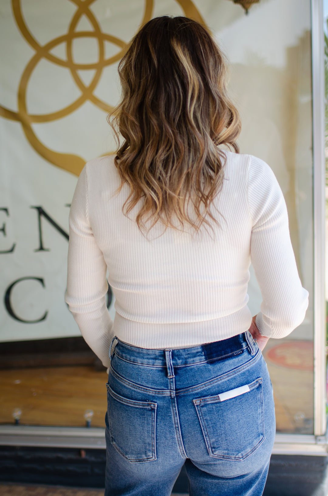 Turn Me Around Twist Front Ribbed Bodysuit in Cream