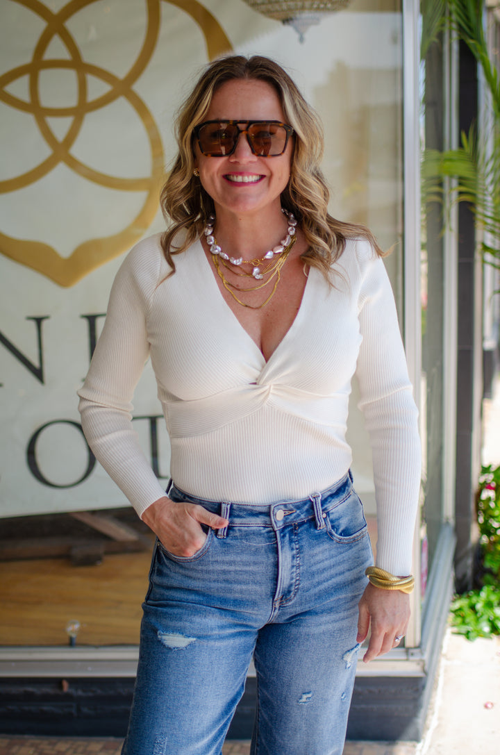 Turn Me Around Twist Front Ribbed Bodysuit in Cream