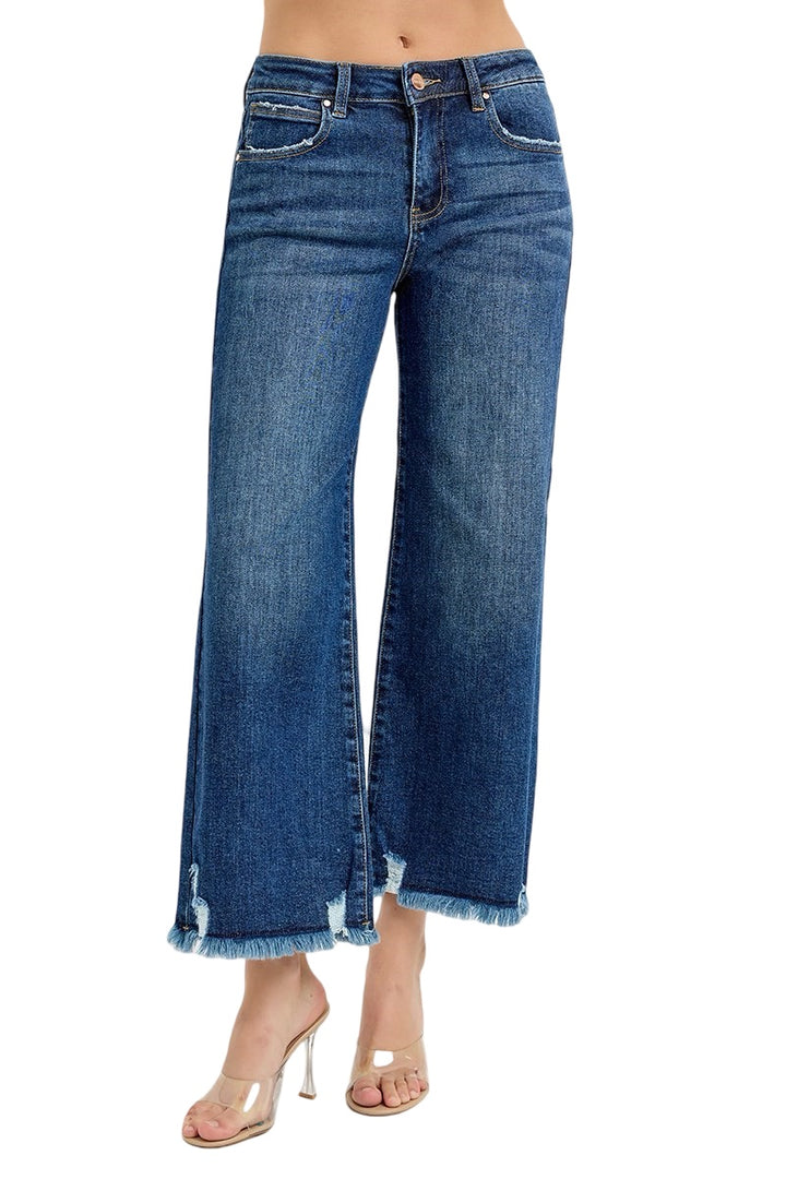 Risen Wide Leg Raw Edge Hem Jeans in a Dark Wash