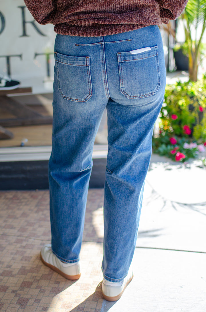 Risen 4 Way Stretch Mid Rise Barrel Leg Jeans in Dark Wash