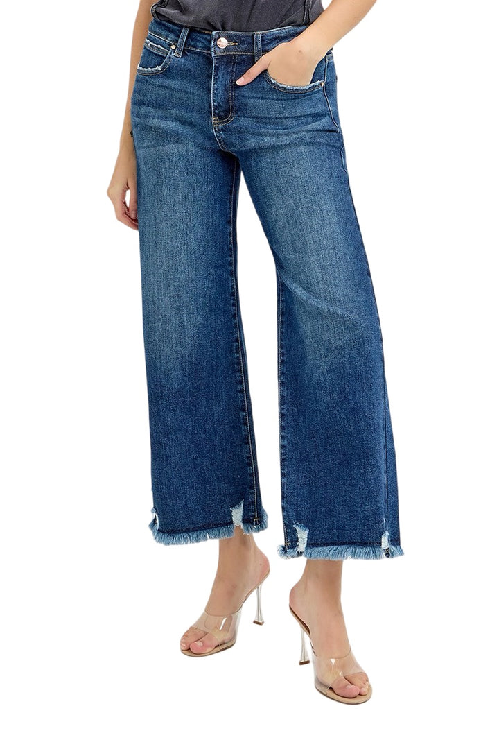 Risen Wide Leg Raw Edge Hem Jeans in a Dark Wash