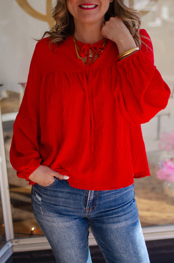 Need You Now Tie Front Long Sleeve Top in Red