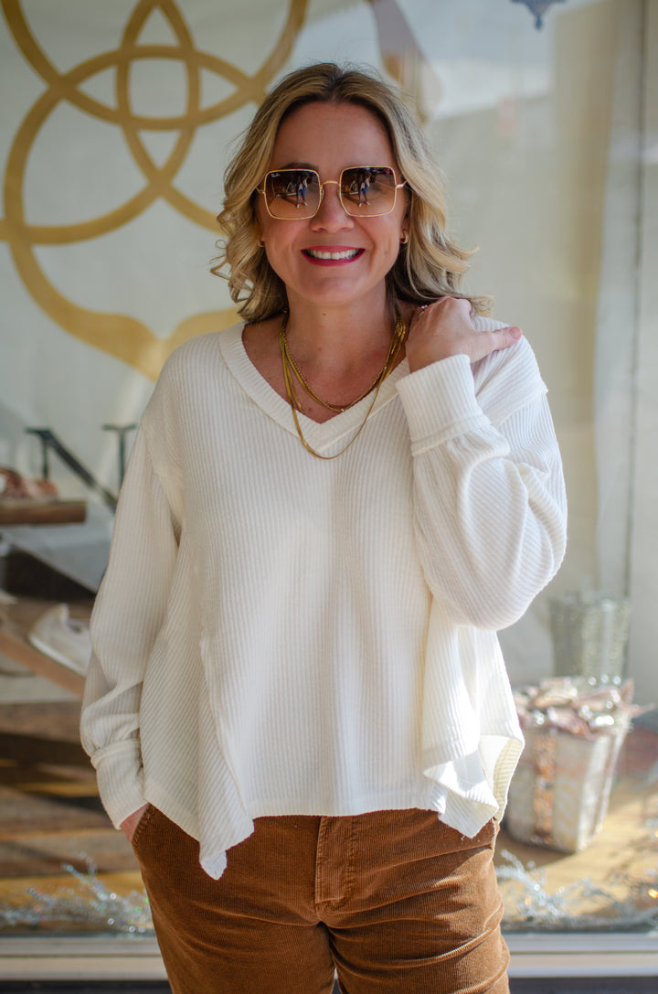 Our Love V-Neck Long Sleeve Side Cut Top in Cream