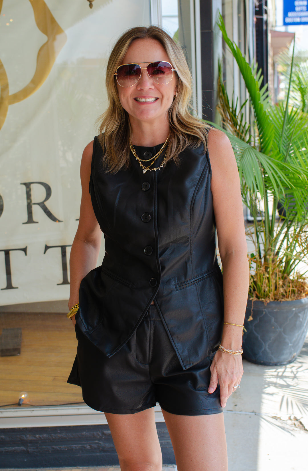 City Strut Faux Leather High Rise Shorts in Black