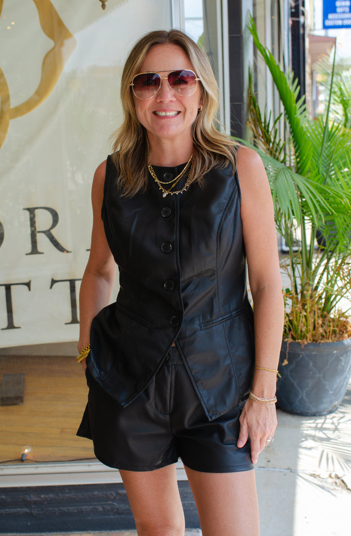 City Strut Faux Leather High Rise Shorts in Black