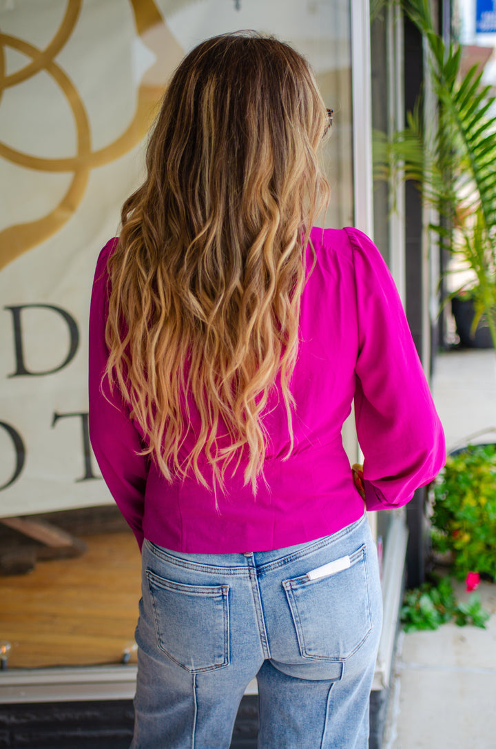 Run To You Long Sleeve Surplice Top with Gold Button Detail in Magenta