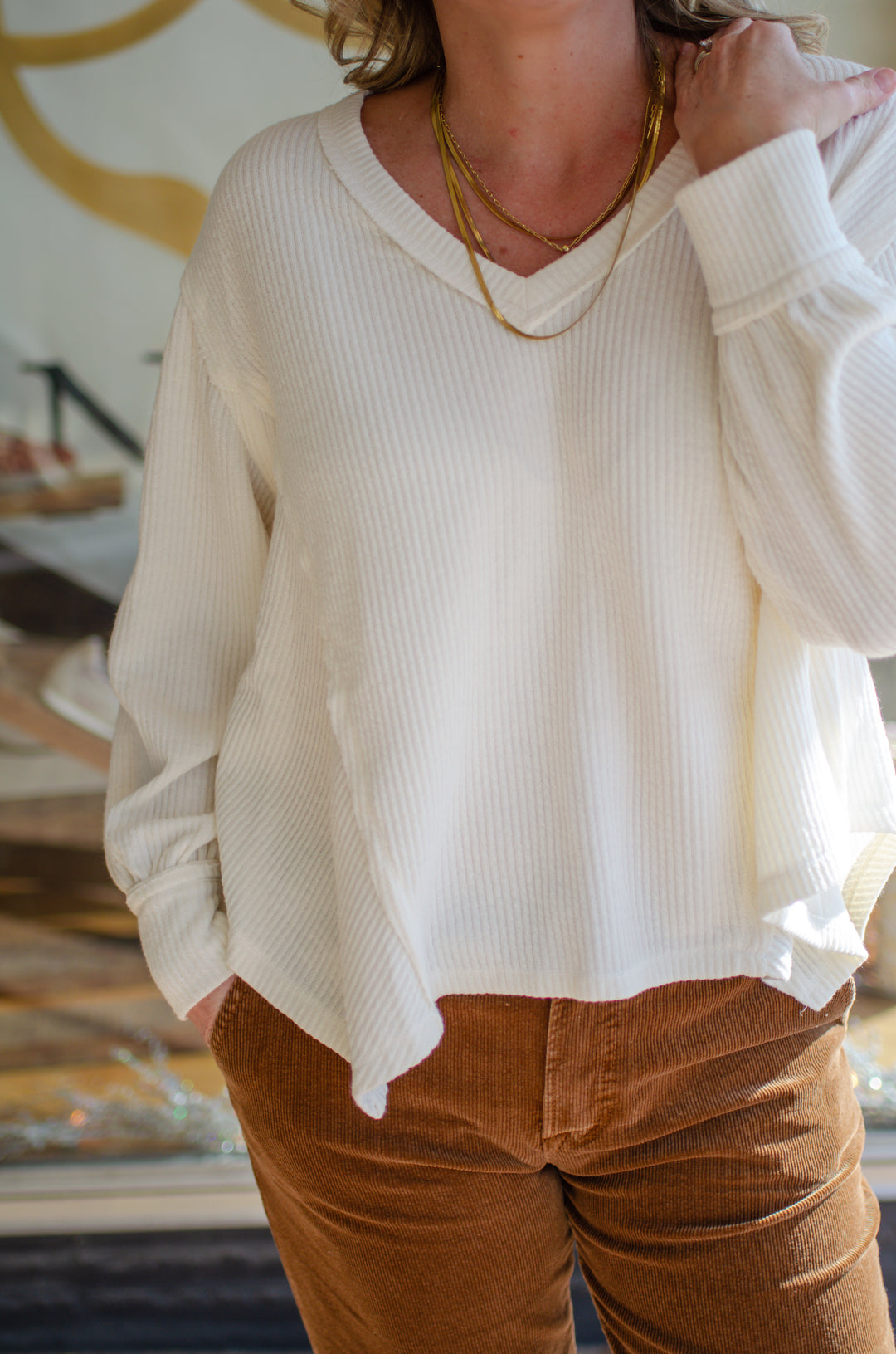 Our Love V-Neck Long Sleeve Side Cut Top in Cream