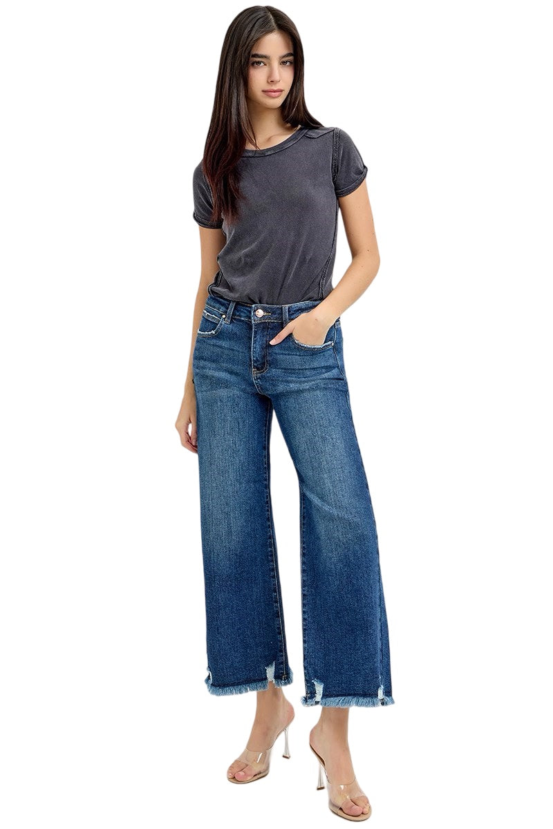 Risen Wide Leg Raw Edge Hem Jeans in a Dark Wash