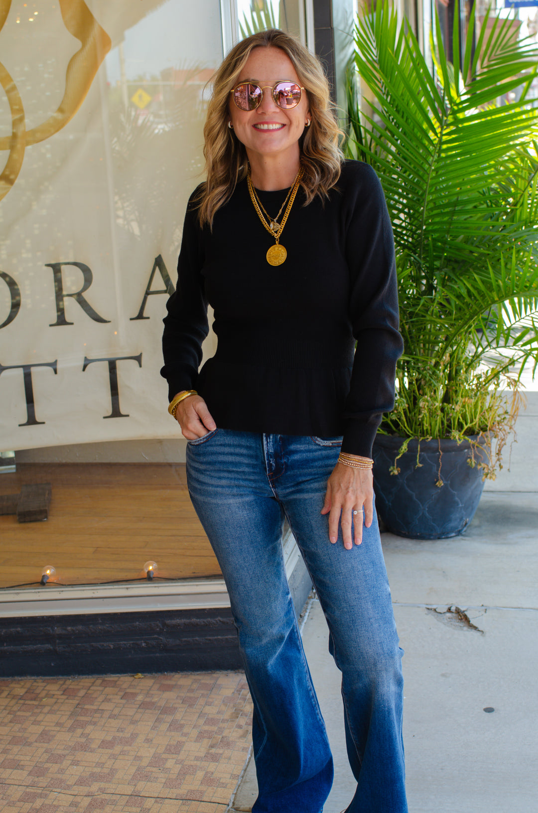 Hold Me Close Fitted Peplum Sweater in Black