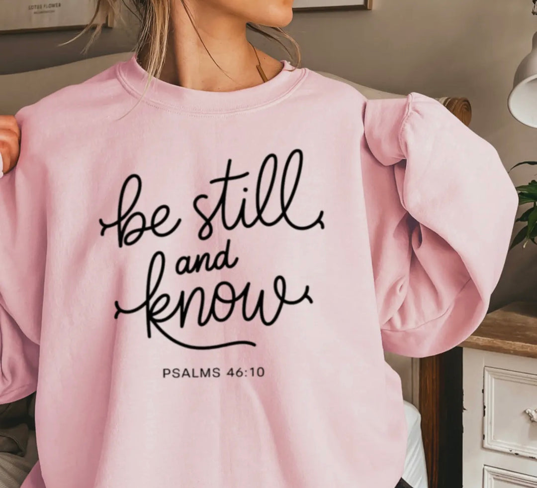 Be Still & Know Christian Graphic Sweatshirt in Pink