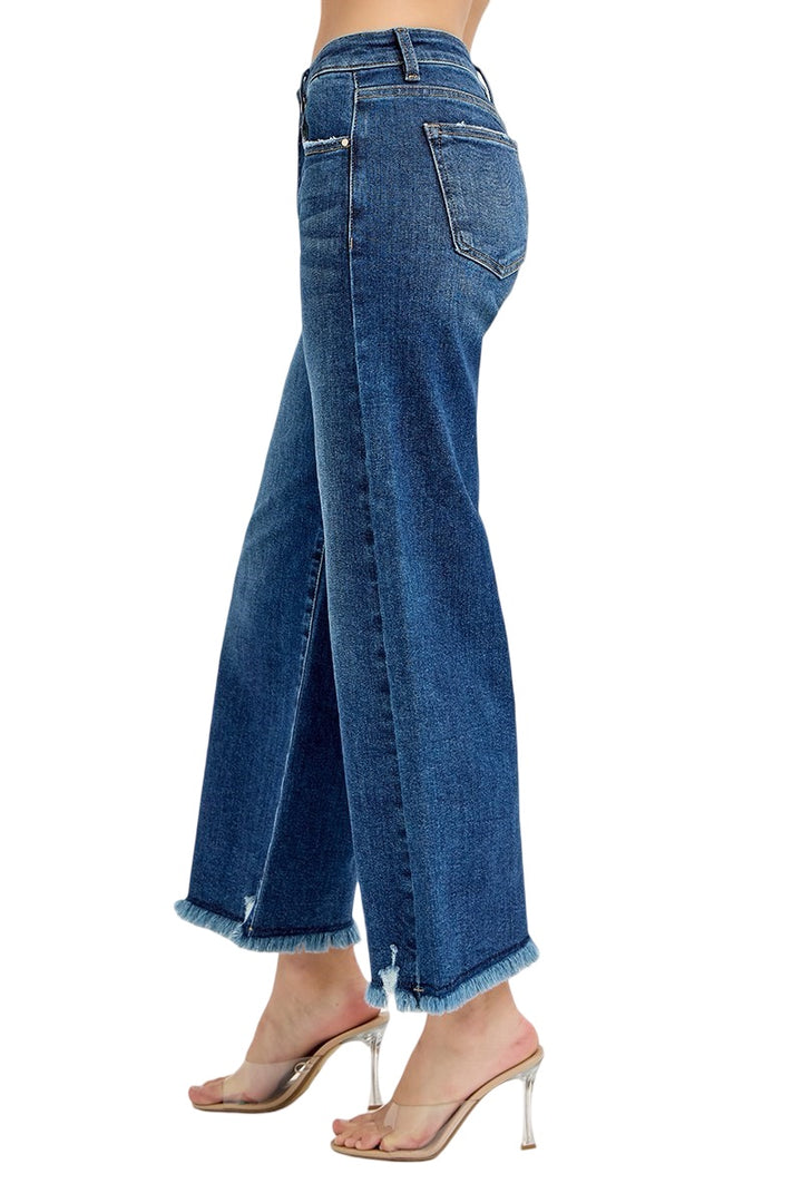 Risen Wide Leg Raw Edge Hem Jeans in a Dark Wash