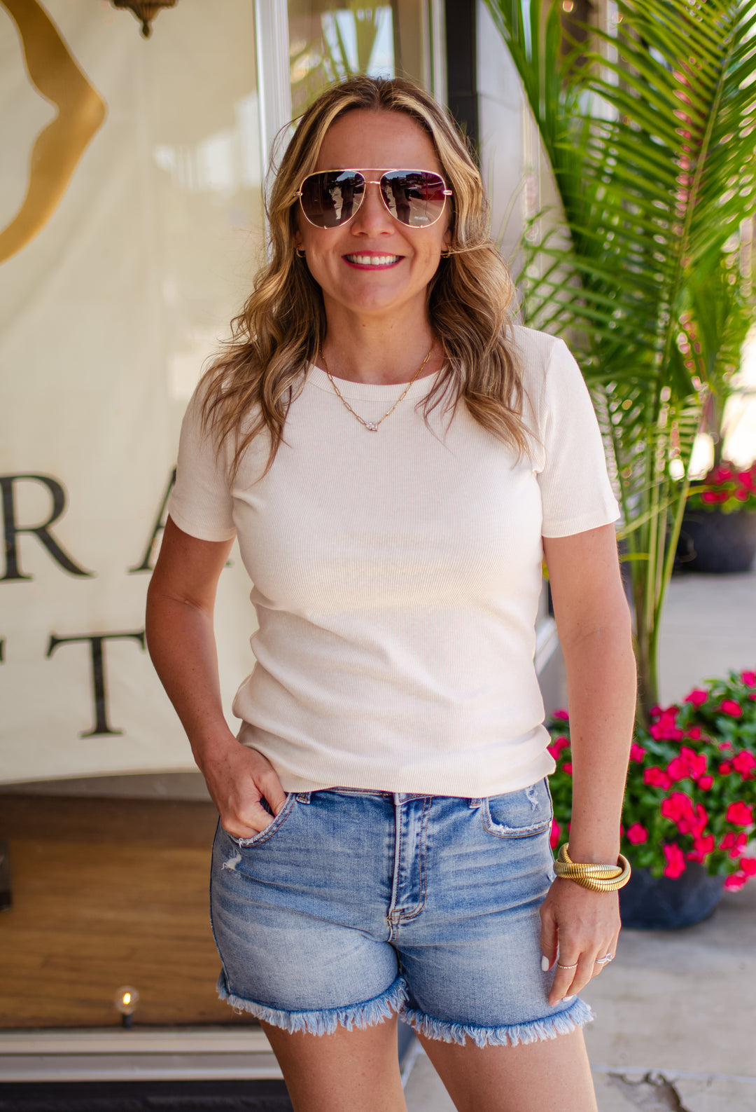 Risen High Rise Frayed Hem Shorts in Medium Wash