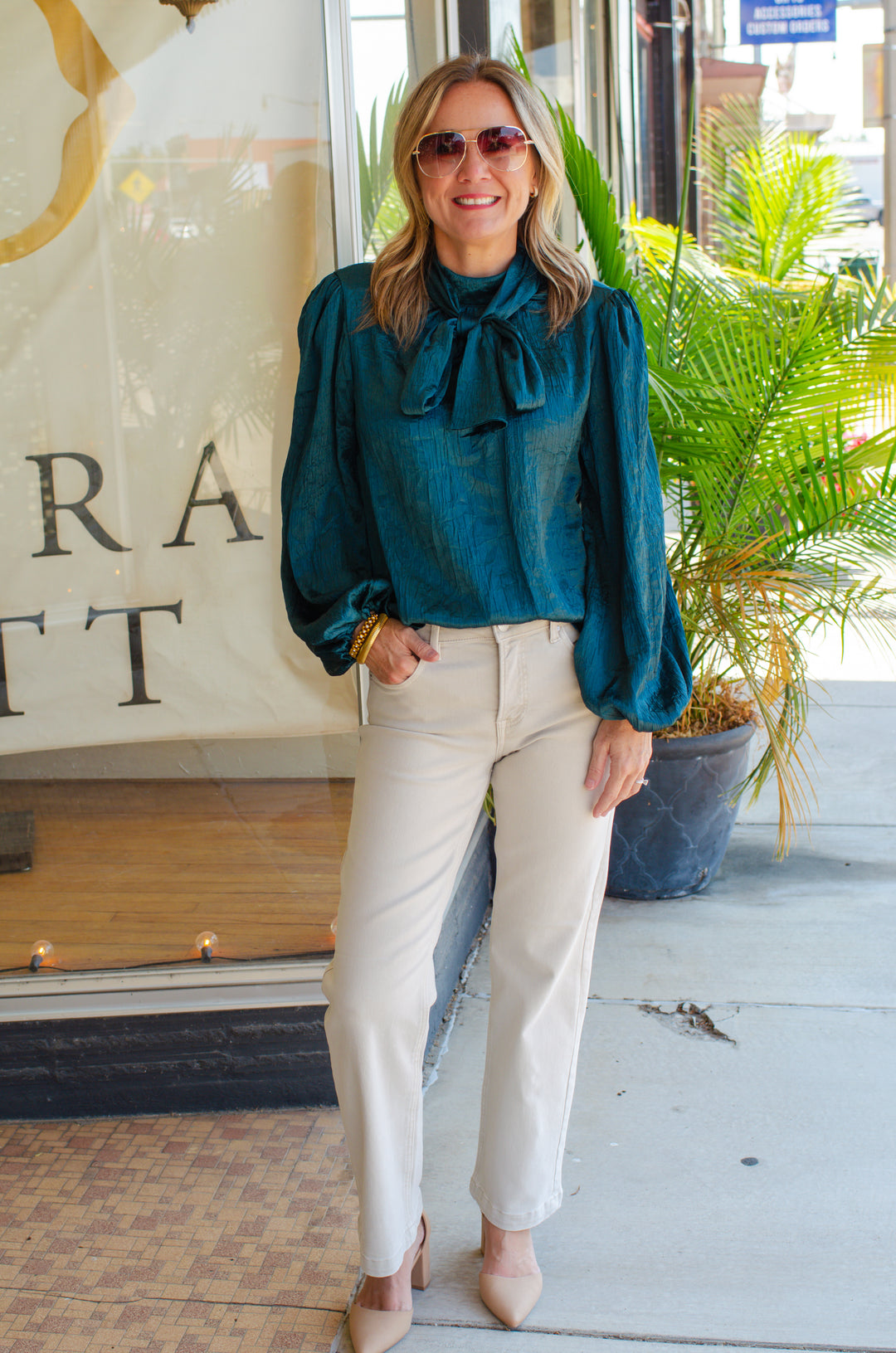 True Heart Bow Neckline Textured Satin Long Sleeve Blouse in Emerald Green