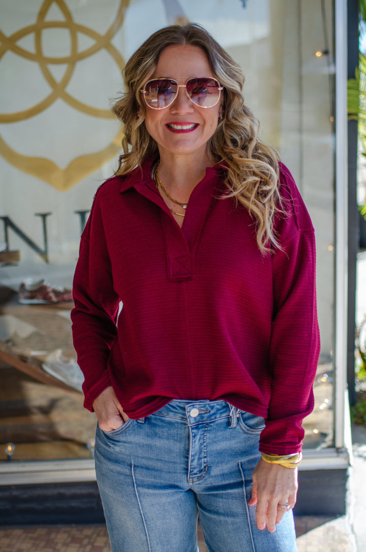 Take Your Time Split Neckline Long Sleeve Collared Top in Burgundy