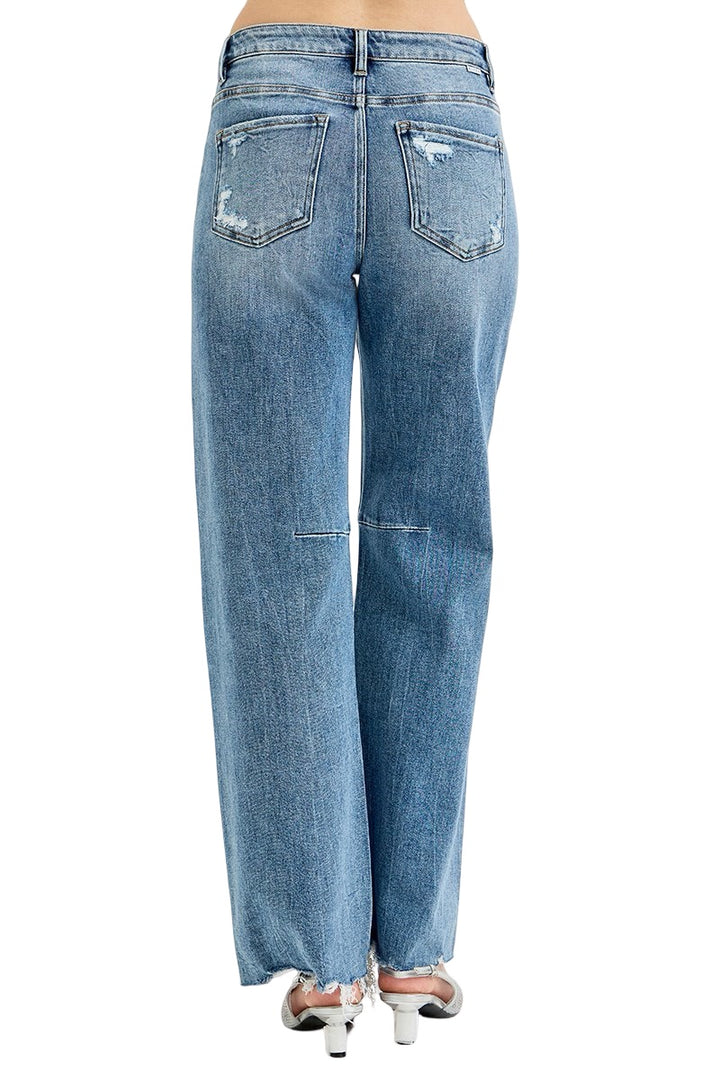 Risen Mid Rise Distressed Wide Leg Jeans in Medium Wash