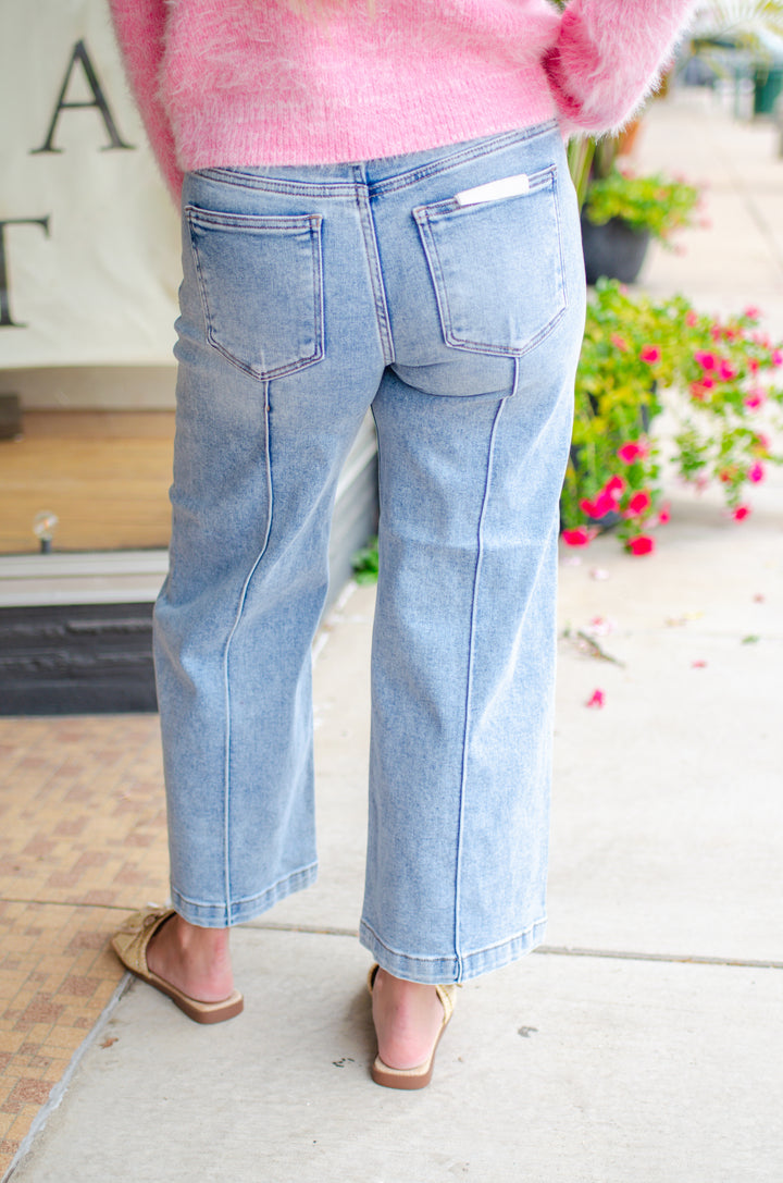 Risen Mid Rise Wide Crop Front & Back Pintuck Detailed Jeans in Light Wash