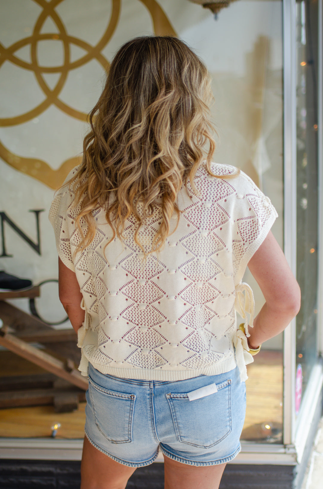 Moroccan Getaway Crochet Tie Side Knit Top in Cream