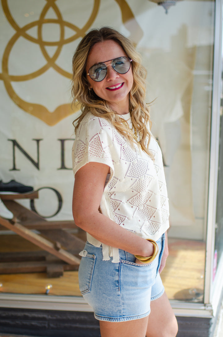 Moroccan Getaway Crochet Tie Side Knit Top in Cream