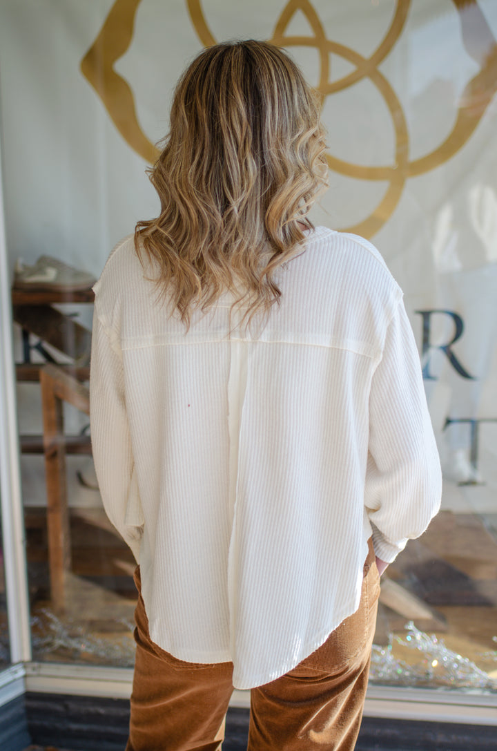 Our Love V-Neck Long Sleeve Side Cut Top in Cream