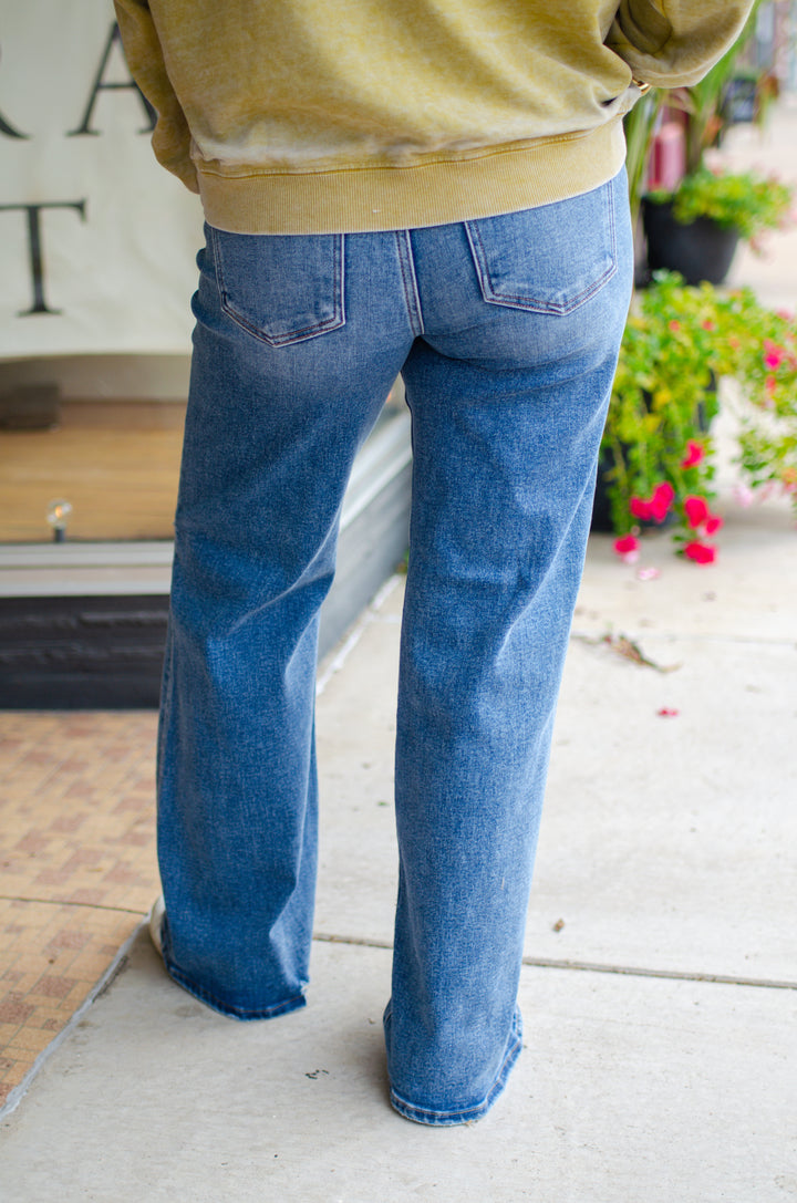 Risen Mid Rise Tummy Control Wide Jeans in Medium Wash