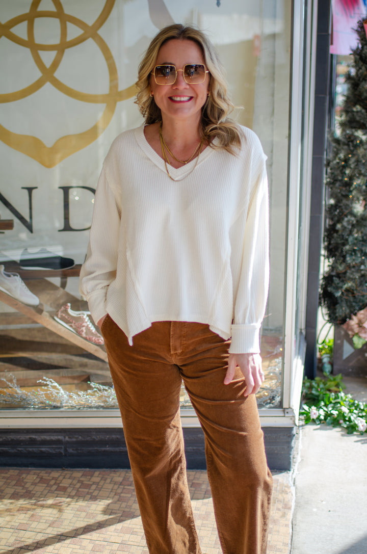 Our Love V-Neck Long Sleeve Side Cut Top in Cream