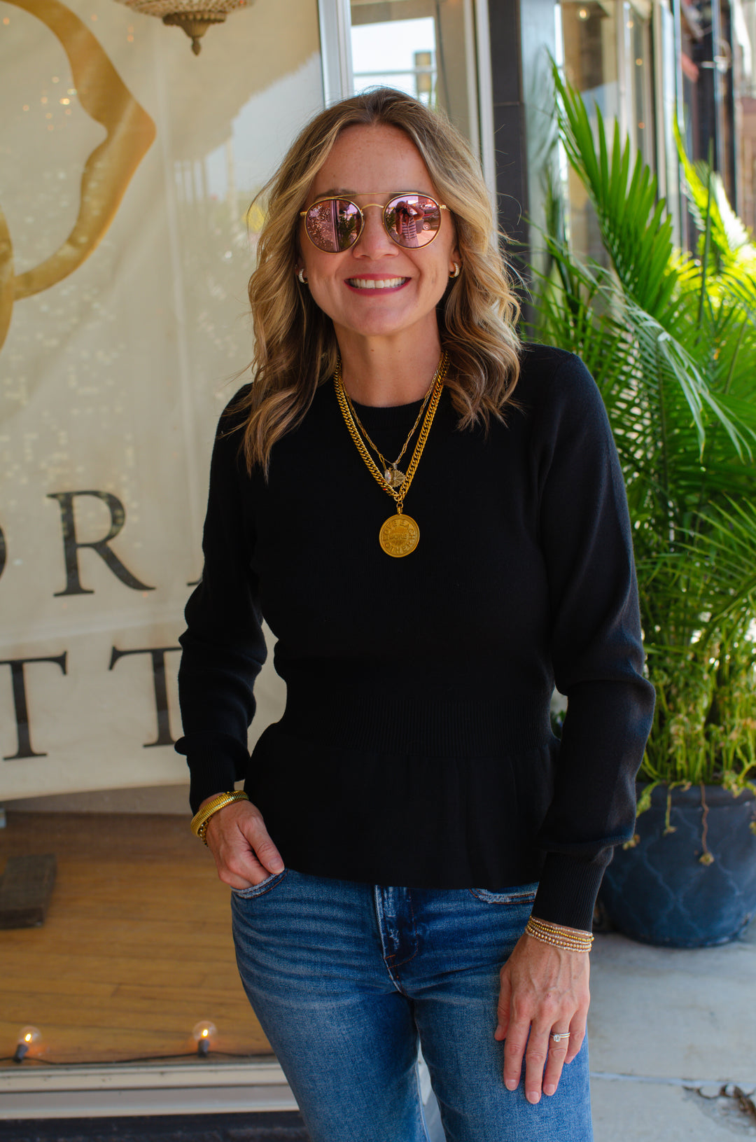 Hold Me Close Fitted Peplum Sweater in Black