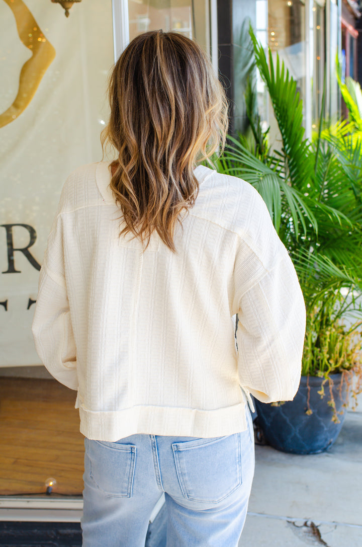 Breathless Modern Textured Boxy Long Sleeve Top in Cream